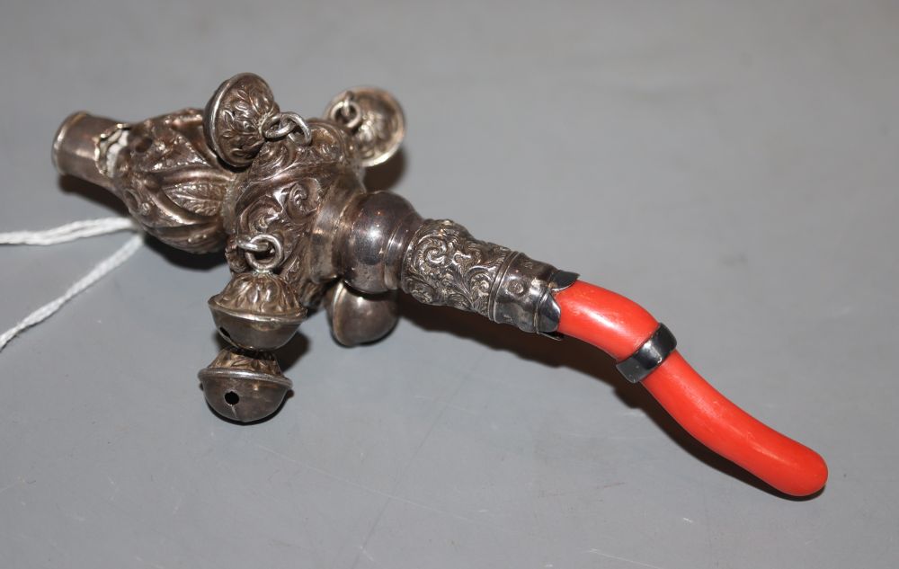 A George IV silver childs rattle with whistle, six bells and coral teether, Taylor & Perry, Birmingham, 1827, 12.4cm,